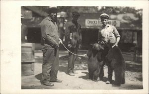 Men w/ Bear Cubs on Leash Roadside US Unidentified Real Photo Postcard c1910