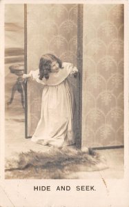 Lot349 hide and seek  girl playing  postcard uk