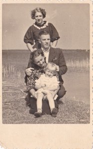 Family Posing For Portrait Circa 1938 Real Photo