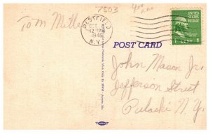 Sailing Dingy  over rollong Waves