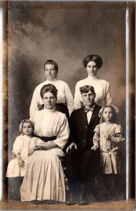 Real Photo Postcard Family Portrait at Howe Photo Studio