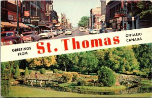 Postcard ON St. Thomas Talbot Street Drug Store Classic Cars Shops 1950s S100