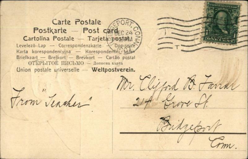 Christmas - Santa Claus in Brown Suit w/ Puppet c1910 Embossed Postcard