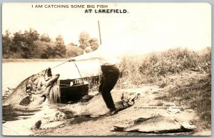 LAKEFIELD ONT. CANADA FISHING EXAGGERATED ANTIQUE REAL PHOTO POSTCARD RPPC