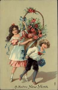 New Year Young Girl and Boy with Basket of Roses Gel c1910 Vintage Postcard