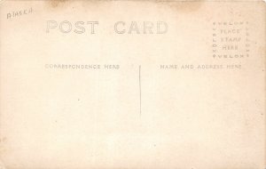 H59/ Alaska? RPPC Postcard c1910 Interior Home Parlor Stove Man Sofa