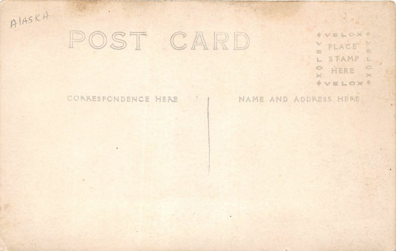 H59/ Alaska? RPPC Postcard c1910 Interior Home Parlor Stove Man Sofa