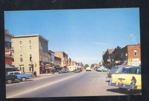 ROCHESTER INDIANA DOWNTOWN STREET SCENE OLD CARS STORES VINTAGE POSTCARD