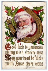 1910 Christmas Santa Claus Horseshoe Holly Berries Embossed Chicago IL Postcard