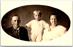 Man with Suit and Tie, Woman White Dress with Child Portrait - Vintage Postcard