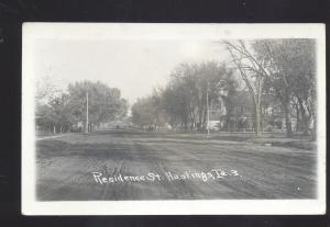 RPPC HASTINGS IOWA RESIDENCE STREET SCENE VINTAGE REAL PHOTO POSTCARD