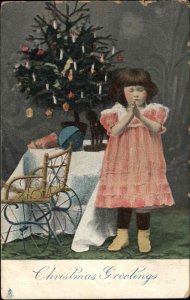 Christmas TUCK Girl Prays Beside Wheelchair Tree c1900-20s Vintage Postcard