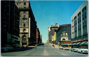 Greetings From Omaha Nebraska Douglas Street Looking West Buildings Postcard