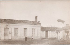 Observation Balloon Children Foreground France Flag Door WW1 era RP Postcard H26
