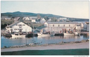 La Gaspesie, Anse a Beaufils, fishing boats unloading their catch at evertide...