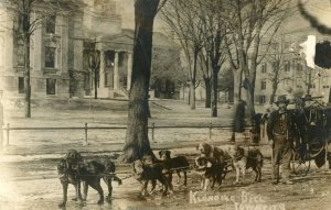 Postcard RPPC View of Wrestler Klondike Bill with Dog Team, Iowa City IA.  P5