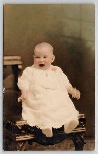 RPPC Happy Baby Hand Colored Beautiful Portrait Real Photo c1915 Postcard T21