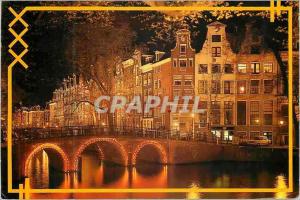 CPA Amsterdam Holland Aussi le soir les canaux d'Amsterdam offrent un beau spect