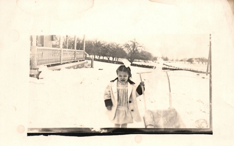 Vintage Postcard 1910's Cute Little Girl in Winter Coat Outside Window Snow