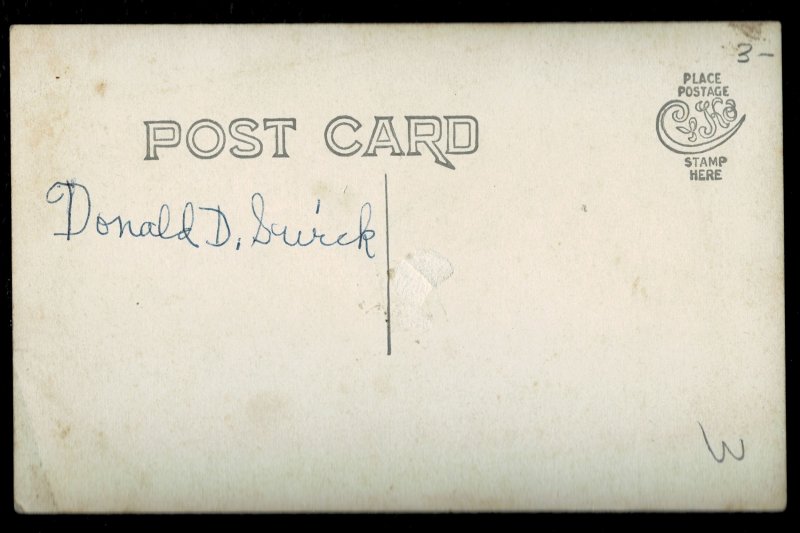 Baby in wicker pram RPPC -