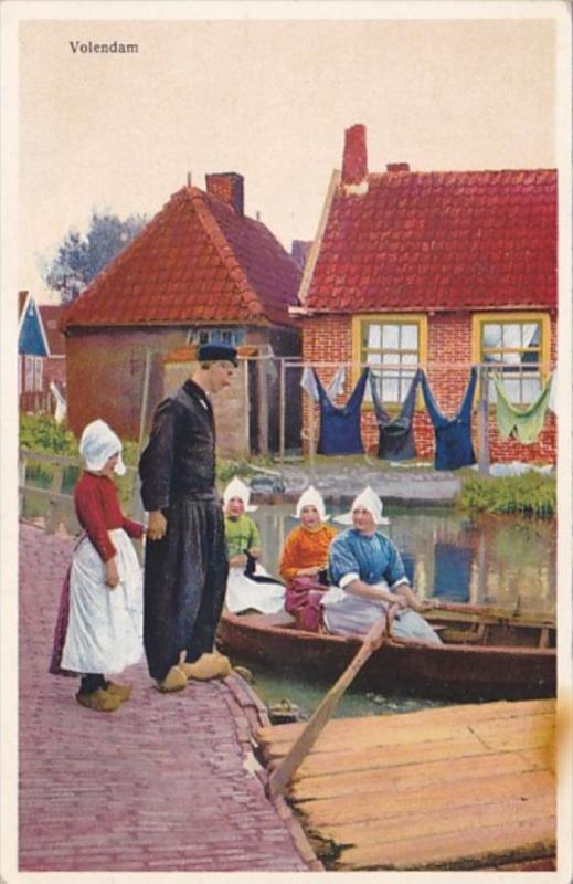 Netherlands Volendam Canal Scene Ladies In Row Boat