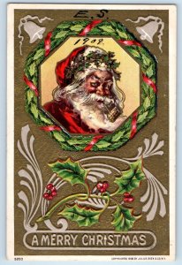 1909 Christmas Santa Claus Pipe Smoke Berries Embossed Clear Lake IA Postcard