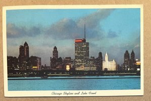 VINTAGE  POSTCARD 1959 USED - SKYLINE AND LAKE FRONT AT NIGHT, CHICAGO, ILLINOIS