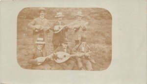 Lot267 group of men playing guitar music social history