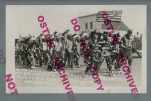 McLaughlin SOUTH DAKOTA RPPC 1921 SIOUX INDIAN PARADE American Flag CM&STP RR