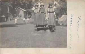 H93/ Interesting RPPC Postcard c1910 Women Park Tree Ring Dresses 92