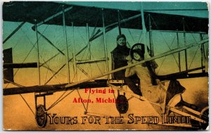 Man and Woman Sitting On Airborne Aeroplane - Afton, Michigan - Vintage Postcard