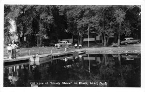 J46/ Black Lake New York RPPC Postcard c1970 Cottages Shady Shore Boats 148