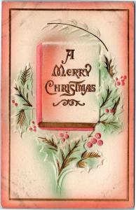 postcard: A Merry Christmas - embossed book with holly