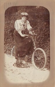 WOMAN ON BICYCLE CYCLIST-LONG SKIRT & HAT~1907 PSMK Unterschleißh PHOTO POSTCARD