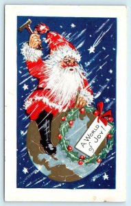 A WORLD OF JOY Christmas Greeting SANTA on Earth Embossed c1910s   Postcard