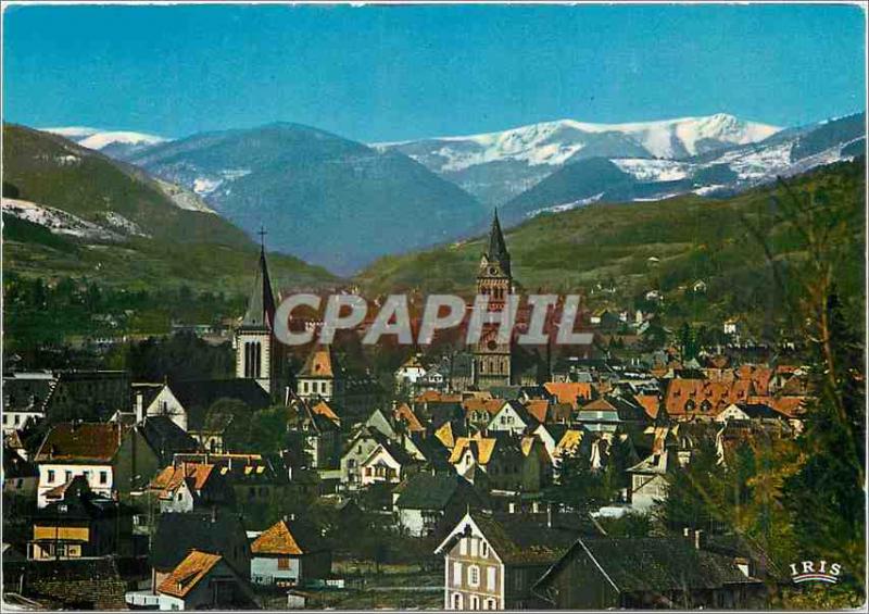 Modern Postcard Munster (Haut Rhin) The city and the Vosges chain