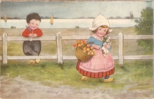 Dutch boy and girl. After the meeting Nice old vintage German postcard