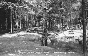 H32/ Harrison Michigan RPPC Postcard c40s Spikehorn Bear Den Deer Indian14