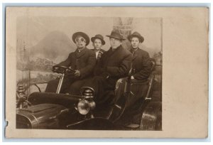 1908 Men Ride Car Studio Portrait Spokane WA RPPC Photo Posted Antique Postcard