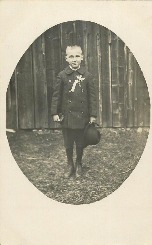 Vintage photo postcard boy in elegant communion suit