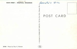 1960s Waupaca Wisconsin Main Wyman autos Business District Postcard 25-5852