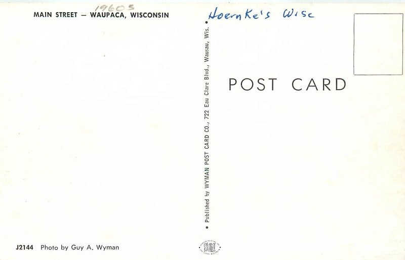 1960s Waupaca Wisconsin Main Wyman autos Business District Postcard 25-5852