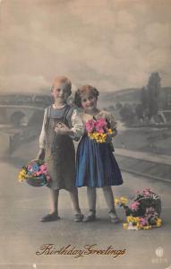 YOUNG GIRL & BOY HOLDING HANDS AND FLOWERS-GILT EMBOSSED BIRTHDAY POSTCARD