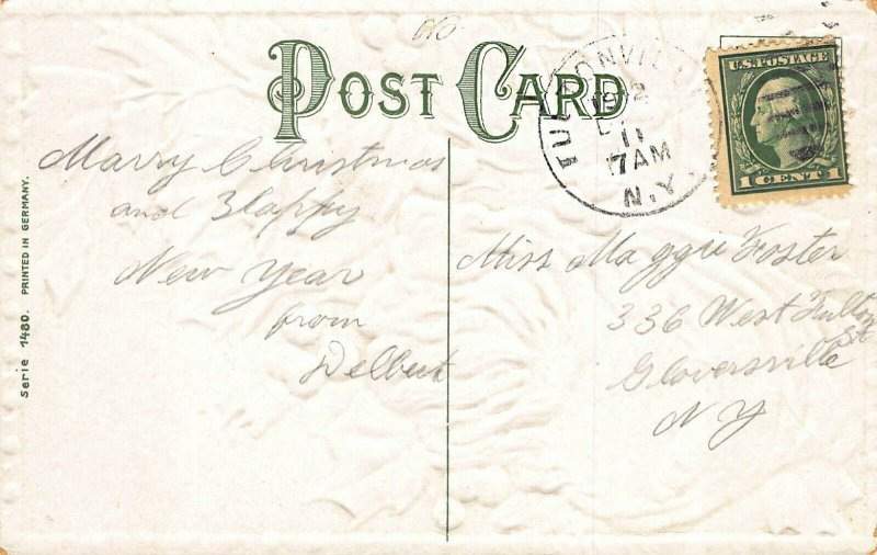 Christmas Greetings Santa Claus Head Red Hat Ivy Berries 1912 Embossed Postcard