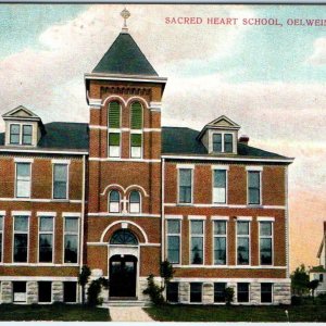 c1910s Oelwein, IA Sacred Heart School Building Litho Photo Postcard Vintage A63