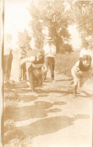 H11/ Interesting RPPC Postcard c10 Track Sprint Race Men Action Shadow 18