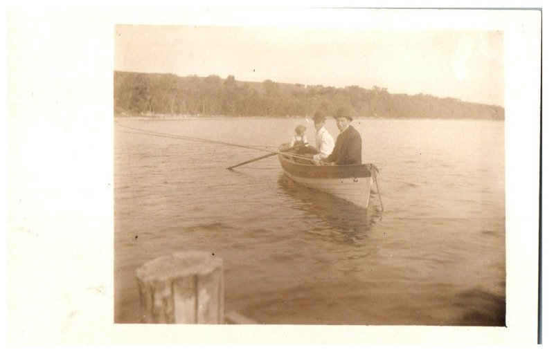 Fishing in a boat Ship Postcard. Posted 1912