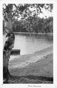 Mora Minnesota~Lake & Shoreline View~Small Boat~Birch Tree~1940-50s Postcard