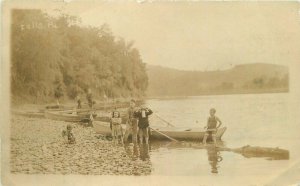 1914 Children Lakeside Rocky Shore Boat RPPC Photo Postcard 21-12338