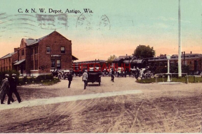 C. & N.W. DEPOT, ANTIGO, WI 1915 vintage autos wait for travelers